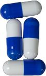 four medication capsules with a dark blue half and a solid white half